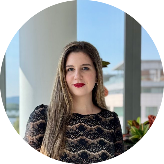 Core team member Natalie Davis smiling in a professional setting with a neutral background